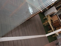 Aluminium overkapping met kunststof vlondervloer, verlichting en vierdelige glazen schuifpui. afmeting 400 ... - afbeelding 6 van  6
