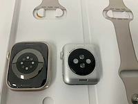 Apple watch series 7 gps 45mm starlight aluminium case with starlight sport band regular (2x) (fmi) - afbeelding 2 van  4