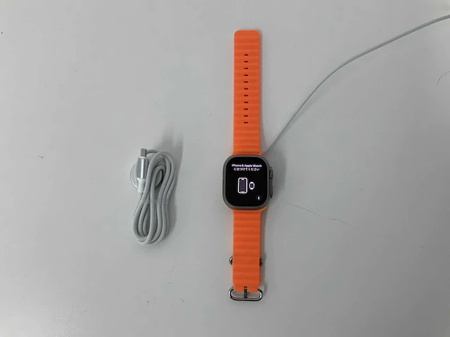 Apple watch ultra 49mm gps+cellular natural titanium with orange wristband - afbeelding 1 van  5