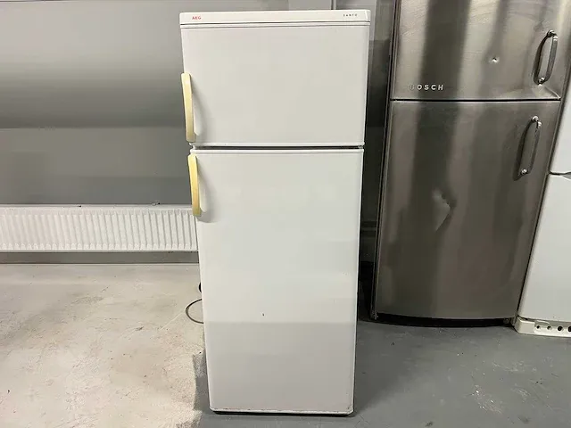 Ariston - aeg koelkast + ariston inbouw 5 pits gaskookstel rvs + ok tv - afbeelding 1 van  10
