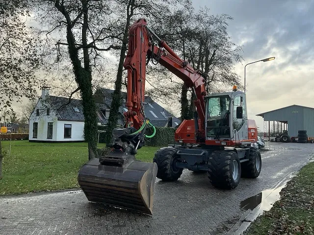 Atlas 140w banden graafmachine - afbeelding 9 van  44