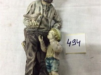 Beeld man met kind - afbeelding 2 van  2