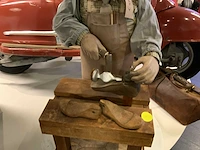 Bewegend decoratieve schoenmaker - afbeelding 2 van  10