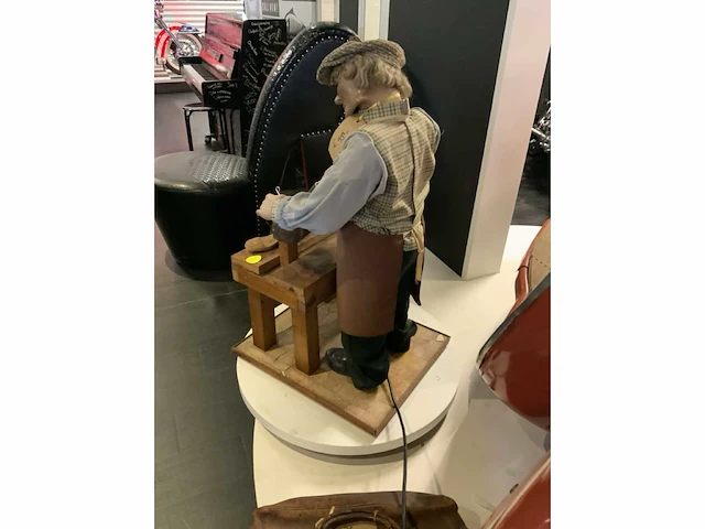 Bewegend decoratieve schoenmaker - afbeelding 6 van  10