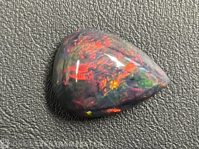 Black opal - 6.32 karaat prachtige black opal - afbeelding 1 van  6