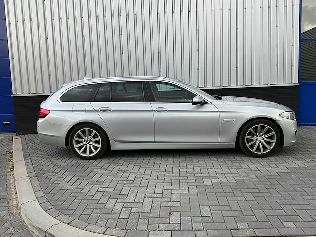 Bmw - 520d touring - personenauto - afbeelding 25 van  33