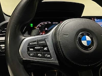 Bmw m135i xdrive high executive 306pk 2020 1-serie f40, p-072-ph - afbeelding 21 van  42