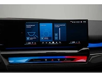 Bmw m5 touring 4.4 v8 hybride 728pk automaat 2025 nieuwe auto - afbeelding 24 van  69
