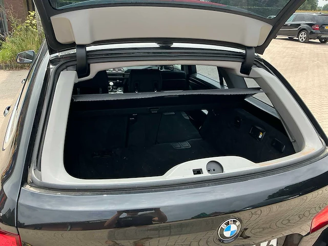 Bmw stationwagen personenauto - afbeelding 24 van  39