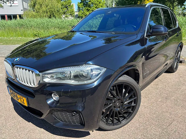 Bmw x5 xdrive50i high executive 7p automaat; 3-srb-12 - afbeelding 1 van  21
