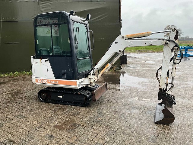 Bobcat x320 minigraafmachine - afbeelding 28 van  32