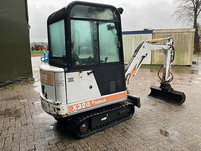 Bobcat x320 minigraafmachine - afbeelding 29 van  32