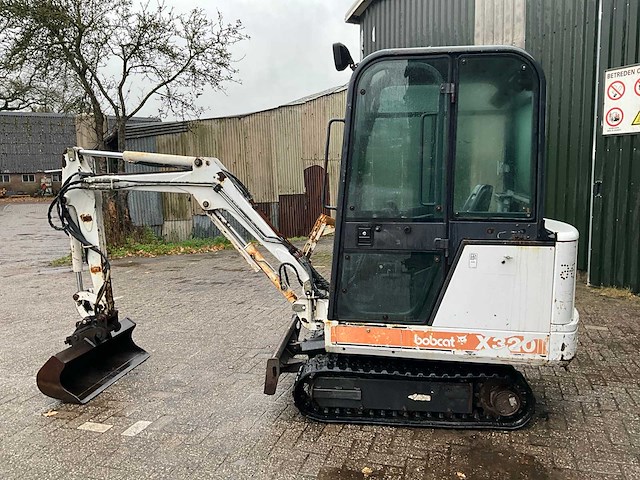 Bobcat x320 minigraafmachine - afbeelding 32 van  32