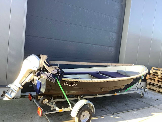 Boot met 10 pk honda en trailer. - afbeelding 5 van  11