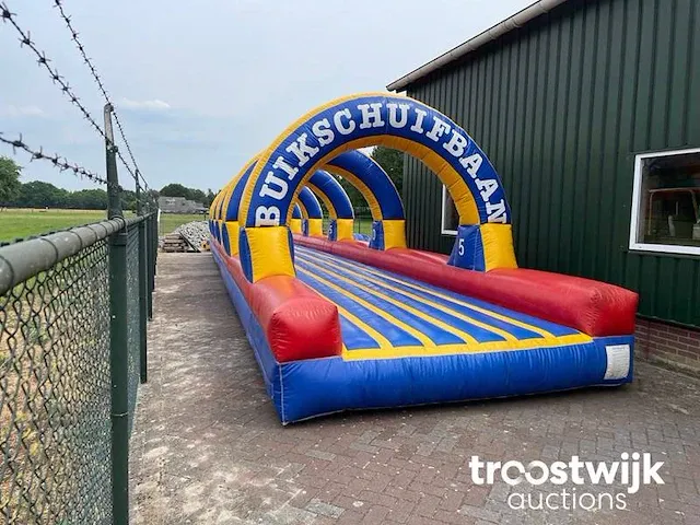 Buikschuifbaan springkussen - afbeelding 1 van  13