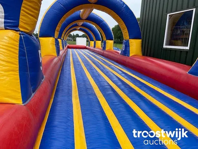 Buikschuifbaan springkussen - afbeelding 3 van  13