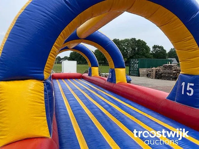 Buikschuifbaan springkussen - afbeelding 5 van  13