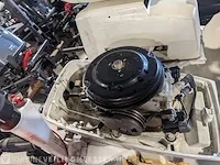 Buitenboord motor johnson, 4 pk 2-takt 2 cilinder kortstaart op knuppel - afbeelding 8 van  9