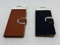 Ca. 170x telefoonhoesje handmade rixus, zwart en bruin - afbeelding 1 van  11