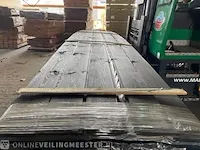 Ca. 80x douglas gg (veer en groef) zwart gecoat , 18x135mm, lengte 570cm