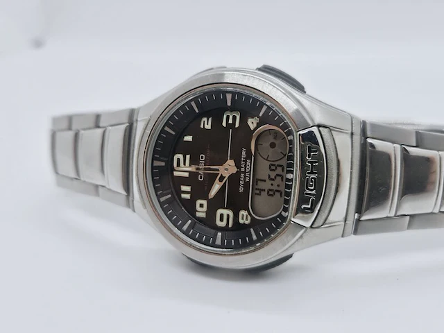 Casio illuminator telememo 30 world time lcd horloge - afbeelding 1 van  10
