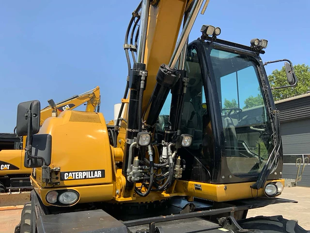 Caterpillar m316d smartboom banden graafmachine met afneembaar draaikantelstuk - afbeelding 18 van  67