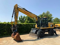 Caterpillar m316d smartboom banden graafmachine met afneembaar draaikantelstuk