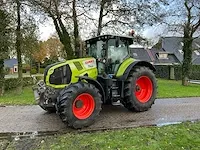 Claas axion 810 vierwielaangedreven landbouwtractor