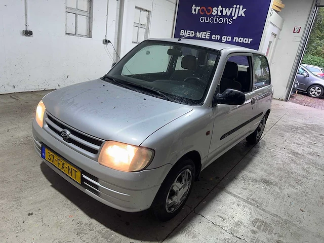 Daihatsu - cuore - 1.0-12v rti automaat- 37-fx-nt - afbeelding 1 van  19
