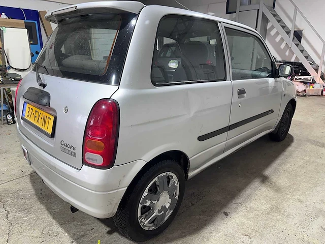 Daihatsu - cuore - 1.0-12v rti automaat- 37-fx-nt - afbeelding 15 van  19