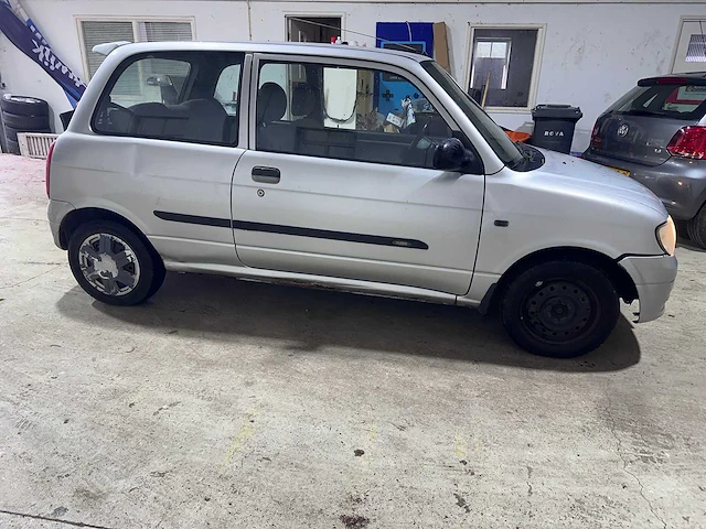 Daihatsu - cuore - 1.0-12v rti automaat- 37-fx-nt - afbeelding 17 van  19