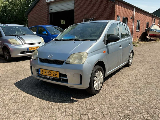 Daihatsu - cuore - 1.0-12v tokyo - personenauto - afbeelding 1 van  13
