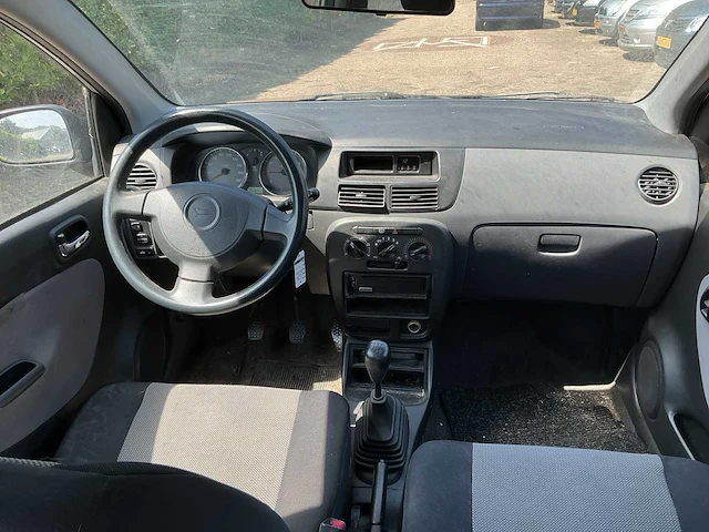 Daihatsu - cuore - 1.0-12v tokyo - personenauto - afbeelding 11 van  13
