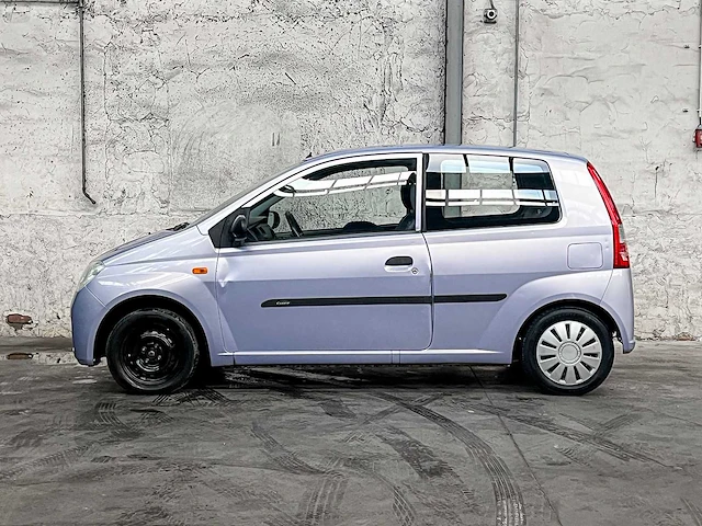 Daihatsu cuore 1.0 12v 58pk 2004 (origineel-nl), 28-nv-gv - afbeelding 8 van  36