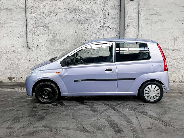 Daihatsu cuore 1.0 12v 58pk 2004 (origineel-nl), 28-nv-gv - afbeelding 9 van  36