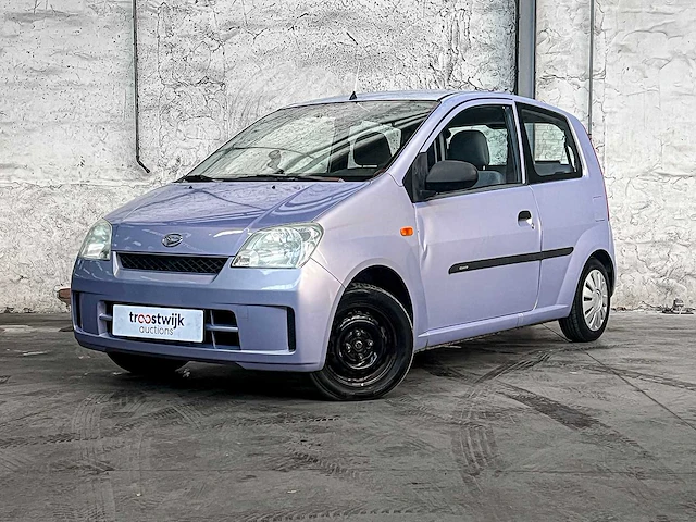 Daihatsu cuore 1.0 12v 58pk 2004 (origineel-nl), 28-nv-gv - afbeelding 10 van  36