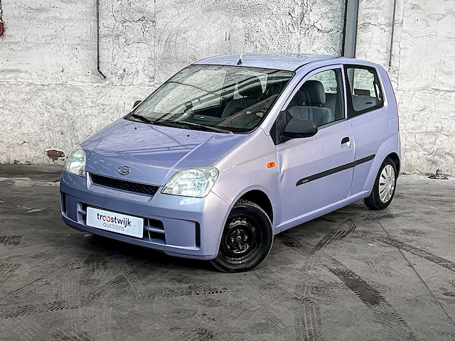 Daihatsu cuore 1.0 12v 58pk 2004 (origineel-nl), 28-nv-gv - afbeelding 1 van  36