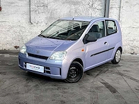 Daihatsu cuore 1.0 12v 58pk 2004 (origineel-nl), 28-nv-gv - afbeelding 1 van  36
