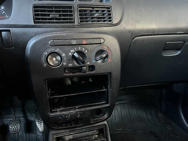 Daihatsu cuore 1.0 12v 58pk 2004 (origineel-nl), 28-nv-gv - afbeelding 18 van  36