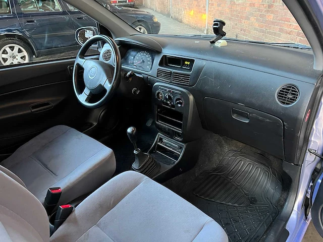 Daihatsu cuore 1.0 12v 58pk 2004 (origineel-nl), 28-nv-gv - afbeelding 22 van  36
