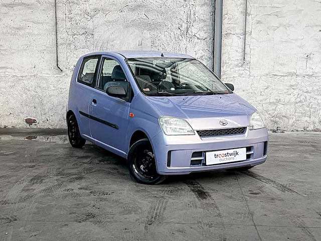 Daihatsu cuore 1.0 12v 58pk 2004 (origineel-nl), 28-nv-gv - afbeelding 34 van  36