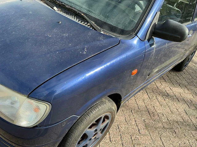Daihatsu cuore personenauto - afbeelding 15 van  23