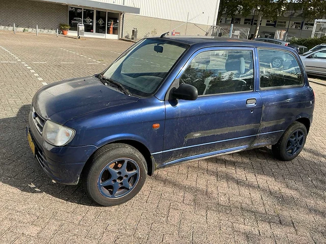 Daihatsu cuore personenauto - afbeelding 1 van  23
