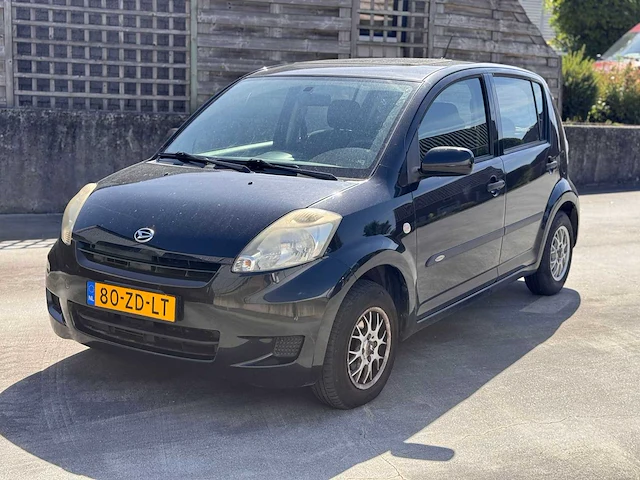 Daihatsu sirion 2 1.0-12v trend, 80-zd-lt - afbeelding 1 van  15