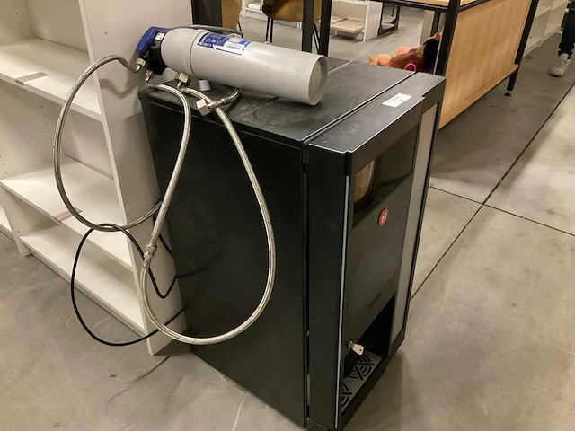 De koffieautomaat - afbeelding 1 van  4