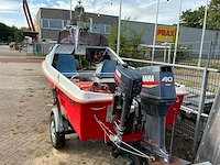Delta 490 polyester consoleboot met buitenboordmotor - afbeelding 17 van  22