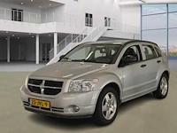Dodge caliber 1.8 s 2009 | 23-jvl-9 - afbeelding 1 van  17
