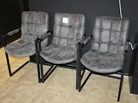 Drie antracieten buisstalen stoelen. - afbeelding 1 van  2