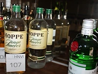 Drie flessen jonge jenever. - afbeelding 1 van  2