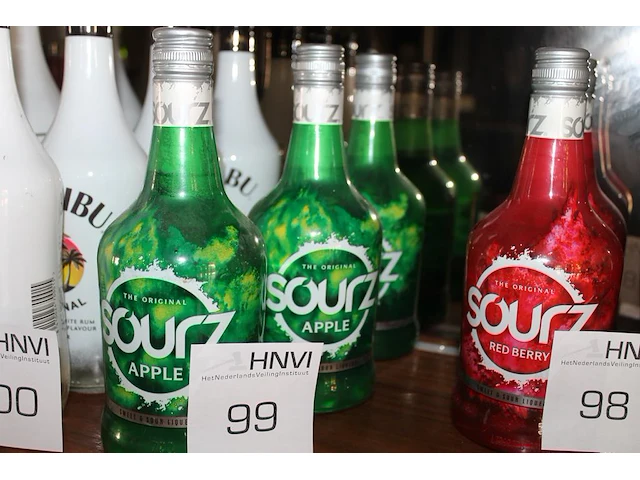 Drie flessen sourz apple. - afbeelding 1 van  2